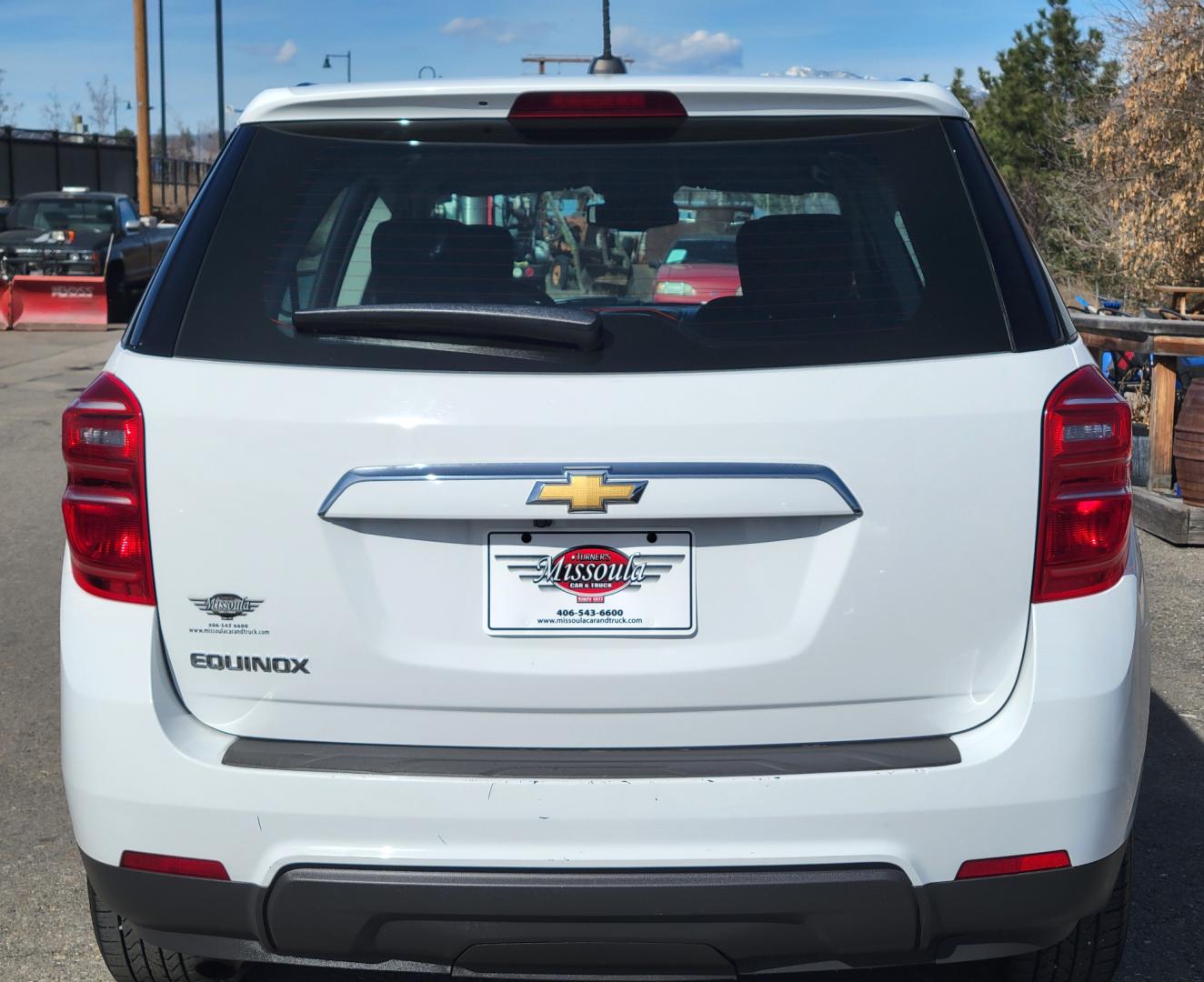 2017 White /Black Chevrolet Equinox LS 2WD (2GNALAEK3H1) with an 2.4L L4 DOHC 16V FFV engine, 6A transmission, located at 450 N Russell, Missoula, MT, 59801, (406) 543-6600, 46.874496, -114.017433 - Nice Front Wheel Drive SUV. 2.4L I4 Engine. 6 Speed Automatic Transmission. Bluetooth. Backup Camera. Air. Cruise. Tilt. Power Windows and Locks. - Photo#2